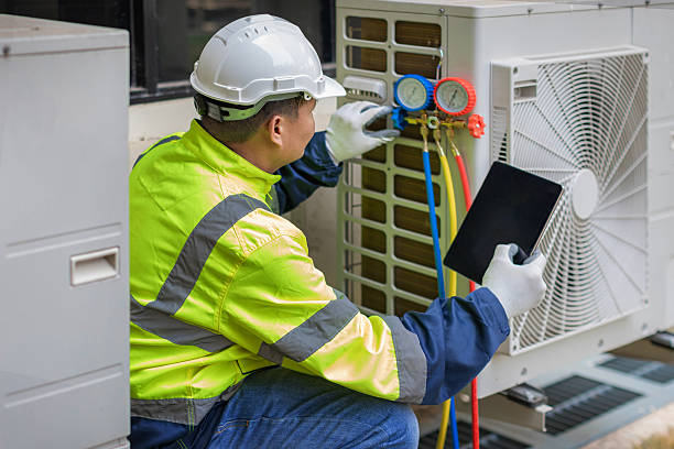 Professional Air Duct Cleaning technician working in Benton, TN